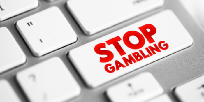 Keyboard button with text Stop Gambling