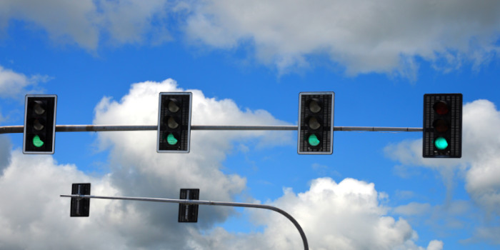 Four green traffic lights