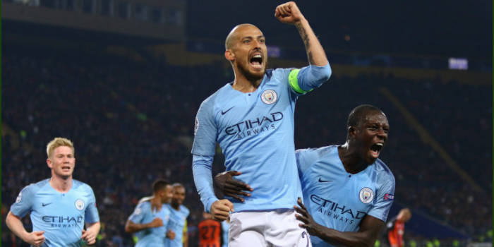 Manchester City's players cheering.